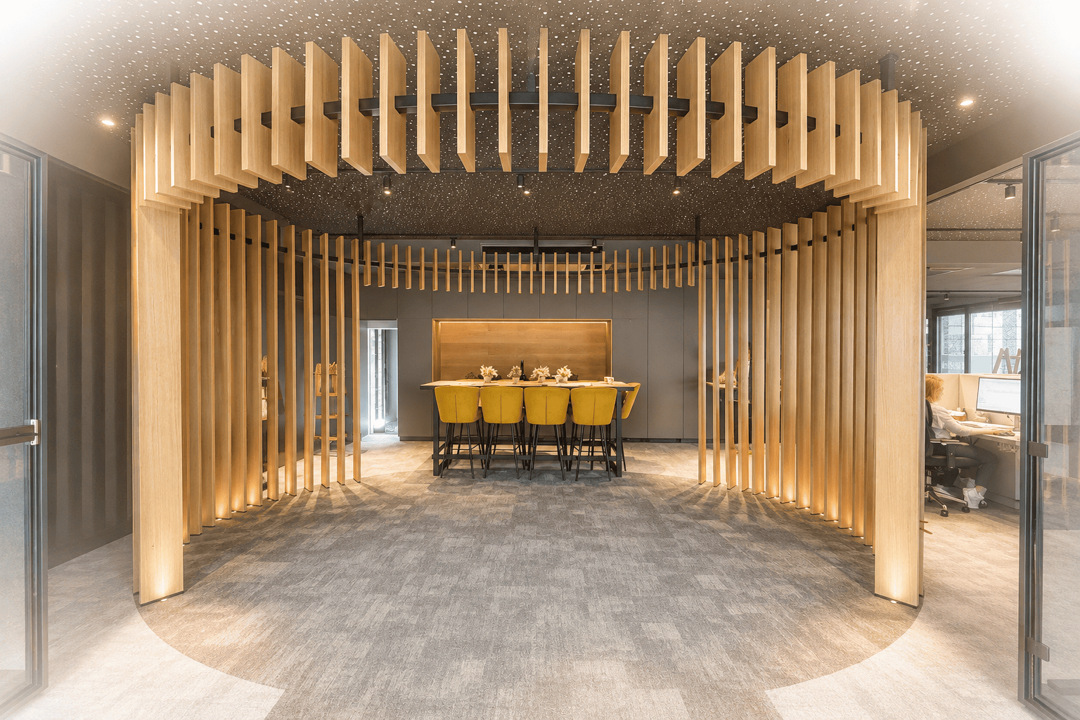 Custom oak slat structure over a lounge bar