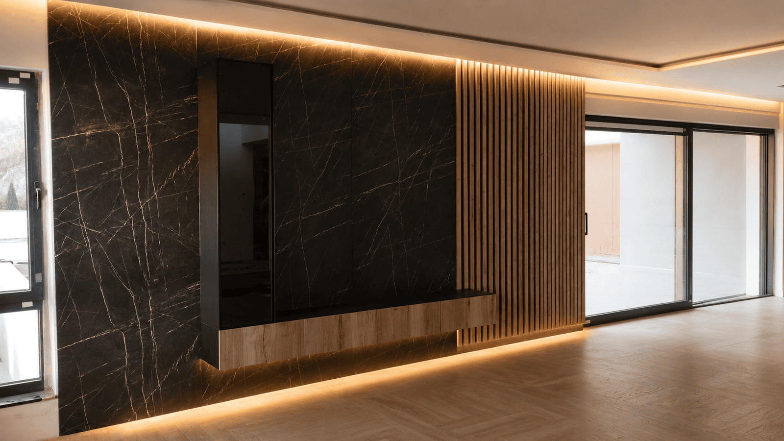 Black marble media wall with oak slat panelling