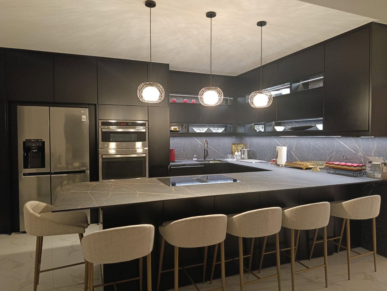 Modern Kitchen — dark fronts with stone worktop