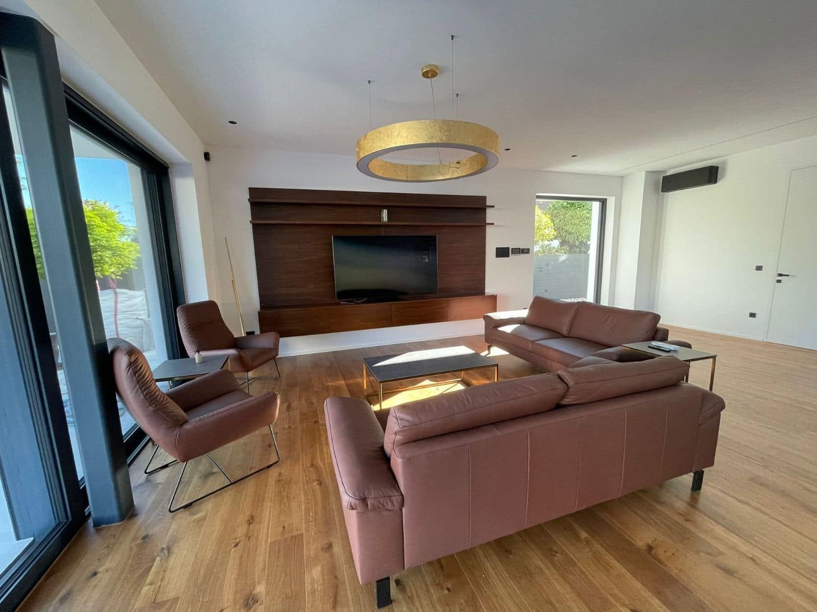 Luxury Apartment, Munich — living room with walnut media wall